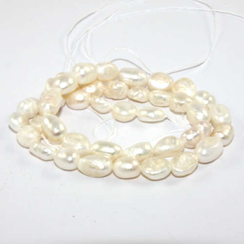 6mm - 7mm White Oval Freshwater Pearls- AA Grade - 38cm Strand